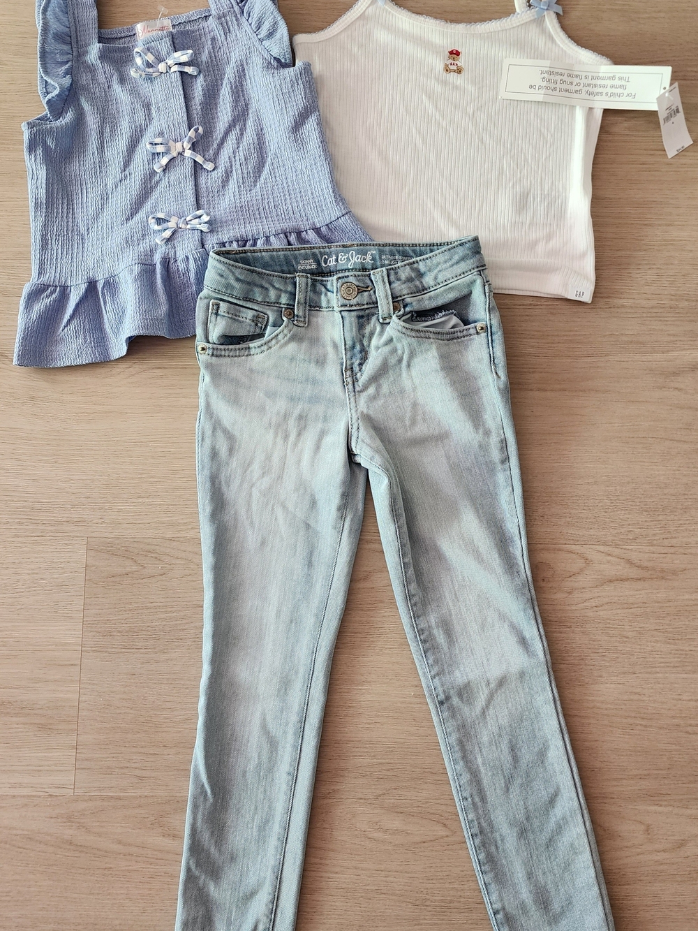 Light Wash Girls' Skinny Jeans With Light Blue And White Tops